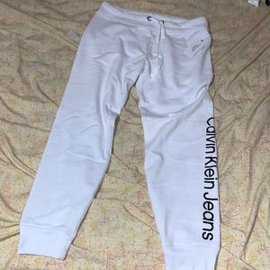 woman’s white calvin klein jogger sweatpants